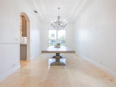 Experience luxury living in Weston Hills, a premier gated golf on Weston Hills Country Club in Florida - for sale on GolfHomes.com, golf home, golf lot