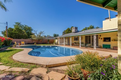 Welcome to this sprawling mid-century ranch home in the beloved on Encanto 18 Golf Course in Arizona - for sale on GolfHomes.com, golf home, golf lot