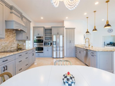 Experience luxury living in Weston Hills, a premier gated golf on Weston Hills Country Club in Florida - for sale on GolfHomes.com, golf home, golf lot