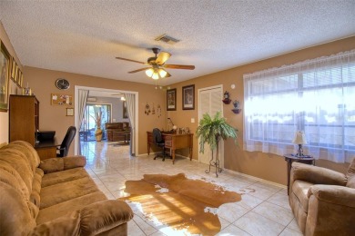 Escape the everyday in this beautiful 3 bedroom, 2 bath SPLIT on Meadow Oaks Golf and Country Club in Florida - for sale on GolfHomes.com, golf home, golf lot