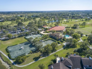 Invest in Location with this Lakefront property overlooking the on Meadowood Golf and Tennis Club in Florida - for sale on GolfHomes.com, golf home, golf lot