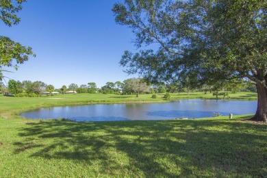 Invest in Location with this Lakefront property overlooking the on Meadowood Golf and Tennis Club in Florida - for sale on GolfHomes.com, golf home, golf lot