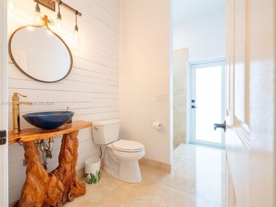 Experience luxury living in Weston Hills, a premier gated golf on Weston Hills Country Club in Florida - for sale on GolfHomes.com, golf home, golf lot