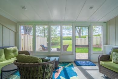 Two outdoor living areas, an enclosed porch and two bedrooms on The Eagle Pointe Golf Resort in Indiana - for sale on GolfHomes.com, golf home, golf lot