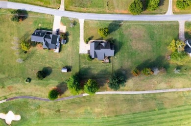 Welcome to this stunning 4-bedroom, 2.5-bath brick home nestled on Meadow Lakes Golf Course in Georgia - for sale on GolfHomes.com, golf home, golf lot