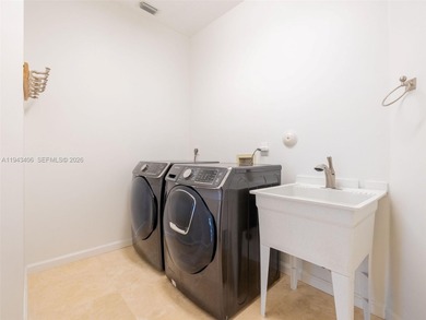 Experience luxury living in Weston Hills, a premier gated golf on Weston Hills Country Club in Florida - for sale on GolfHomes.com, golf home, golf lot