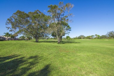 Invest in Location with this Lakefront property overlooking the on Meadowood Golf and Tennis Club in Florida - for sale on GolfHomes.com, golf home, golf lot