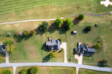 Welcome to this stunning 4-bedroom, 2.5-bath brick home nestled on Meadow Lakes Golf Course in Georgia - for sale on GolfHomes.com, golf home, golf lot