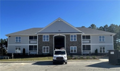 This beautiful two bedroom, two bathroom luxury condo in Fairway on Anderson Creek Golf Club in North Carolina - for sale on GolfHomes.com, golf home, golf lot