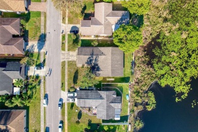 Escape the everyday in this beautiful 3 bedroom, 2 bath SPLIT on Meadow Oaks Golf and Country Club in Florida - for sale on GolfHomes.com, golf home, golf lot