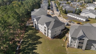 This beautiful two bedroom, two bathroom luxury condo in Fairway on Anderson Creek Golf Club in North Carolina - for sale on GolfHomes.com, golf home, golf lot