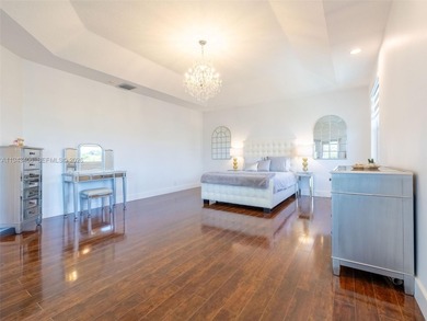 Experience luxury living in Weston Hills, a premier gated golf on Weston Hills Country Club in Florida - for sale on GolfHomes.com, golf home, golf lot