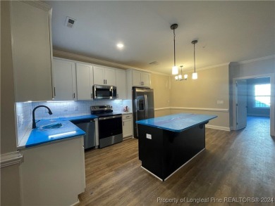 This beautiful two bedroom, two bathroom luxury condo in Fairway on Anderson Creek Golf Club in North Carolina - for sale on GolfHomes.com, golf home, golf lot
