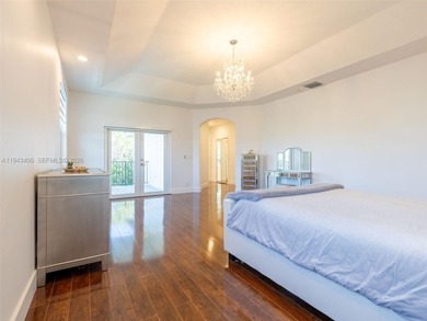 Experience luxury living in Weston Hills, a premier gated golf on Weston Hills Country Club in Florida - for sale on GolfHomes.com, golf home, golf lot