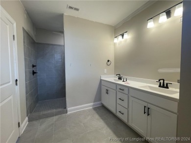 This beautiful two bedroom, two bathroom luxury condo in Fairway on Anderson Creek Golf Club in North Carolina - for sale on GolfHomes.com, golf home, golf lot