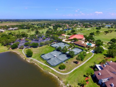 Invest in Location with this Lakefront property overlooking the on Meadowood Golf and Tennis Club in Florida - for sale on GolfHomes.com, golf home, golf lot