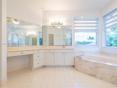 Experience luxury living in Weston Hills, a premier gated golf on Weston Hills Country Club in Florida - for sale on GolfHomes.com, golf home, golf lot