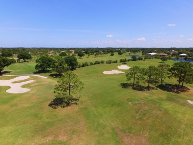 Invest in Location with this Lakefront property overlooking the on Meadowood Golf and Tennis Club in Florida - for sale on GolfHomes.com, golf home, golf lot