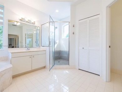 Experience luxury living in Weston Hills, a premier gated golf on Weston Hills Country Club in Florida - for sale on GolfHomes.com, golf home, golf lot