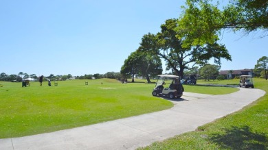 Invest in Location with this Lakefront property overlooking the on Meadowood Golf and Tennis Club in Florida - for sale on GolfHomes.com, golf home, golf lot