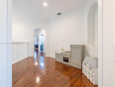 Experience luxury living in Weston Hills, a premier gated golf on Weston Hills Country Club in Florida - for sale on GolfHomes.com, golf home, golf lot