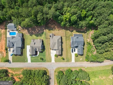 Stunning 6-Bedroom Custom Home in Traditions of Braselton on Traditions of Braselton Golf Club in Georgia - for sale on GolfHomes.com, golf home, golf lot