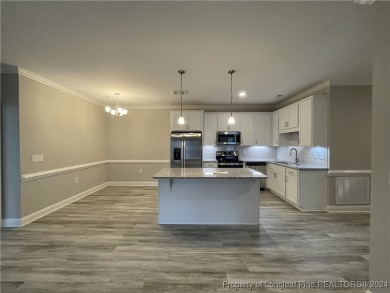 This beautiful two bedroom, two bathroom luxury condo in Fairway on Anderson Creek Golf Club in North Carolina - for sale on GolfHomes.com, golf home, golf lot