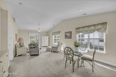 Welcome to 7809 Trap Way, a light-filled end-unit townhome in on Masonboro Country Club in North Carolina - for sale on GolfHomes.com, golf home, golf lot