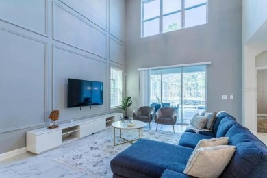 Step into luxury at this stunning 5-bedroom, 5-bath residence on National Golf Course in Florida - for sale on GolfHomes.com, golf home, golf lot