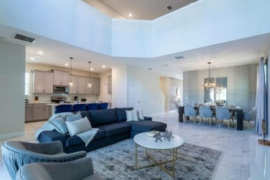 Step into luxury at this stunning 5-bedroom, 5-bath residence on National Golf Course in Florida - for sale on GolfHomes.com, golf home, golf lot