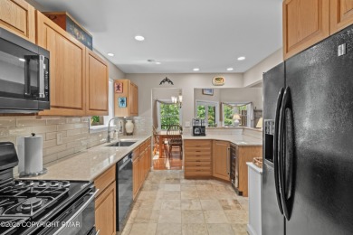 Views are just one feature that make this golf course home on Buck Hill Golf Club  in Pennsylvania - for sale on GolfHomes.com, golf home, golf lot