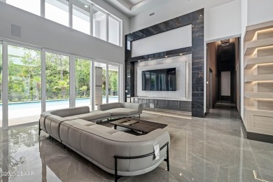 Step into a Masterpiece of Modern Sophistication

Privately on Plantation Bay Golf and Country Club in Florida - for sale on GolfHomes.com, golf home, golf lot