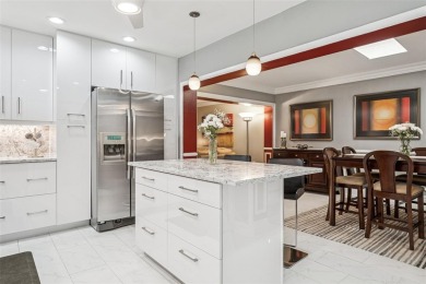 Meticulously maintained, beautifully updated and is very well on Carrollwood Country Club in Florida - for sale on GolfHomes.com, golf home, golf lot