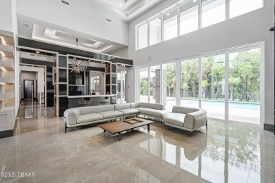 Step into a Masterpiece of Modern Sophistication

Privately on Plantation Bay Golf and Country Club in Florida - for sale on GolfHomes.com, golf home, golf lot