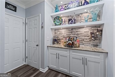 LOCATION! LOCATION! LOCATION!  This beautifully maintained home on Collins Hill Golf Club in Georgia - for sale on GolfHomes.com, golf home, golf lot