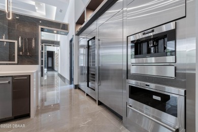 Step into a Masterpiece of Modern Sophistication

Privately on Plantation Bay Golf and Country Club in Florida - for sale on GolfHomes.com, golf home, golf lot