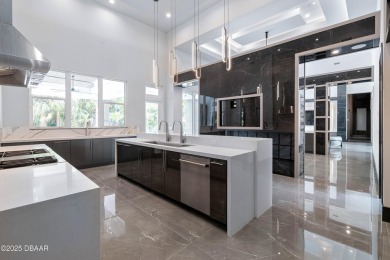 Step into a Masterpiece of Modern Sophistication

Privately on Plantation Bay Golf and Country Club in Florida - for sale on GolfHomes.com, golf home, golf lot