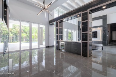 Step into a Masterpiece of Modern Sophistication

Privately on Plantation Bay Golf and Country Club in Florida - for sale on GolfHomes.com, golf home, golf lot
