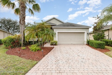 Nestled in the sought-after gated community of Fairway Crossings on Majors Golf Club At Bayside Lakes in Florida - for sale on GolfHomes.com, golf home, golf lot