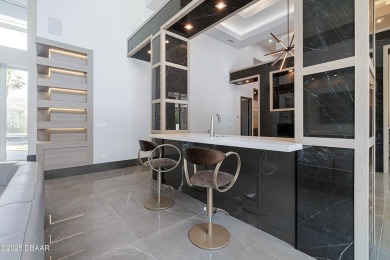 Step into a Masterpiece of Modern Sophistication

Privately on Plantation Bay Golf and Country Club in Florida - for sale on GolfHomes.com, golf home, golf lot
