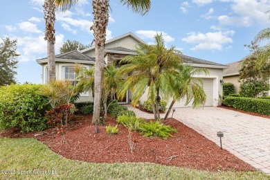 Nestled in the sought-after gated community of Fairway Crossings on Majors Golf Club At Bayside Lakes in Florida - for sale on GolfHomes.com, golf home, golf lot