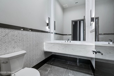 Step into a Masterpiece of Modern Sophistication

Privately on Plantation Bay Golf and Country Club in Florida - for sale on GolfHomes.com, golf home, golf lot