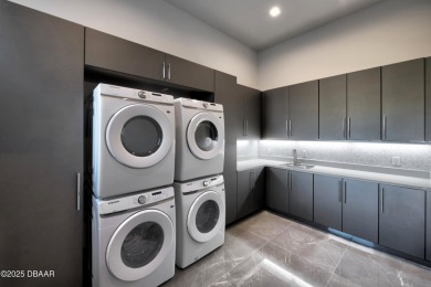 Step into a Masterpiece of Modern Sophistication

Privately on Plantation Bay Golf and Country Club in Florida - for sale on GolfHomes.com, golf home, golf lot