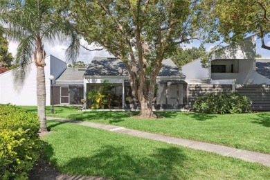 Meticulously maintained, beautifully updated and is very well on Carrollwood Country Club in Florida - for sale on GolfHomes.com, golf home, golf lot