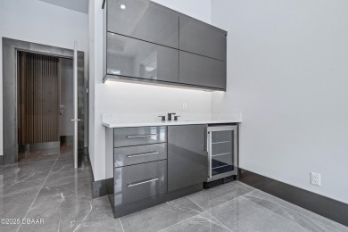 Step into a Masterpiece of Modern Sophistication

Privately on Plantation Bay Golf and Country Club in Florida - for sale on GolfHomes.com, golf home, golf lot