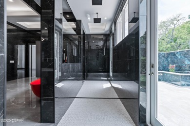 Step into a Masterpiece of Modern Sophistication

Privately on Plantation Bay Golf and Country Club in Florida - for sale on GolfHomes.com, golf home, golf lot