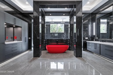 Step into a Masterpiece of Modern Sophistication

Privately on Plantation Bay Golf and Country Club in Florida - for sale on GolfHomes.com, golf home, golf lot