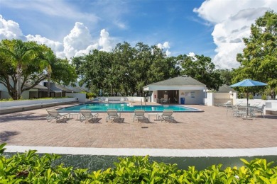 Meticulously maintained, beautifully updated and is very well on Carrollwood Country Club in Florida - for sale on GolfHomes.com, golf home, golf lot