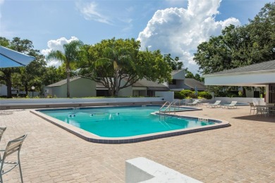Meticulously maintained, beautifully updated and is very well on Carrollwood Country Club in Florida - for sale on GolfHomes.com, golf home, golf lot