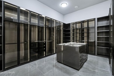 Step into a Masterpiece of Modern Sophistication

Privately on Plantation Bay Golf and Country Club in Florida - for sale on GolfHomes.com, golf home, golf lot
